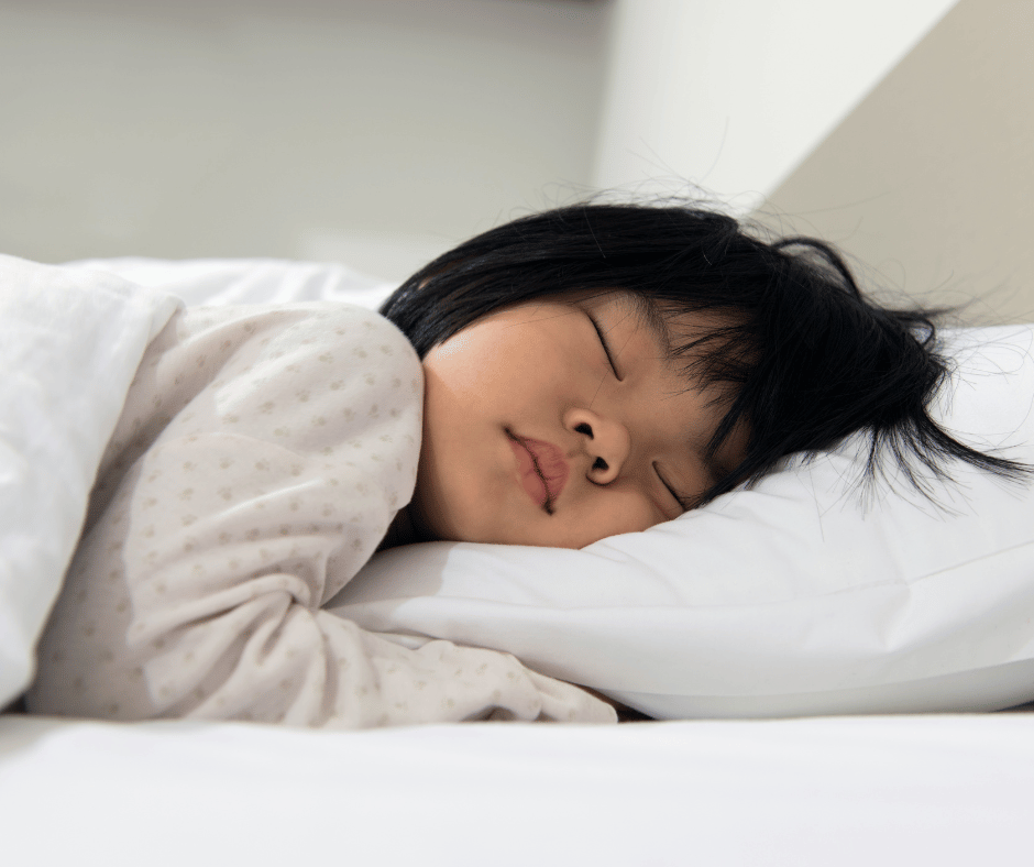 Image of child sleeping in bed